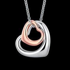 Necklace with heart pendants in white and rose gold