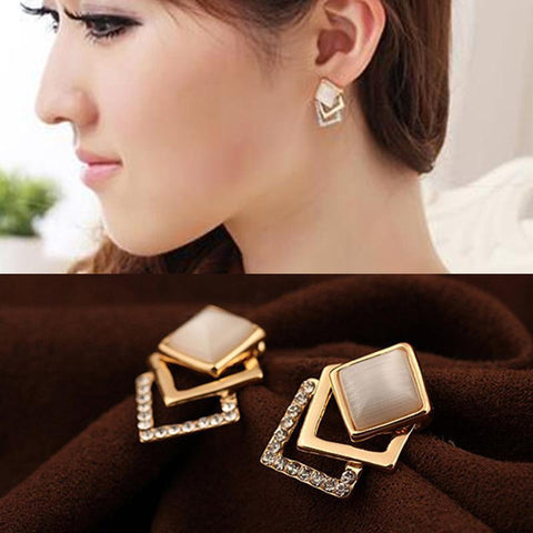 Multilayered earrings with crystal detail